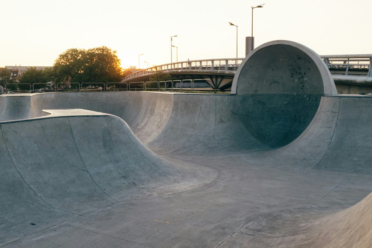 An empty gray concrete skate park similar to the layout at Sun Valley's Sheldon Skatepark Jose Mier